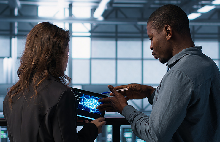 People collaborating with mobile device