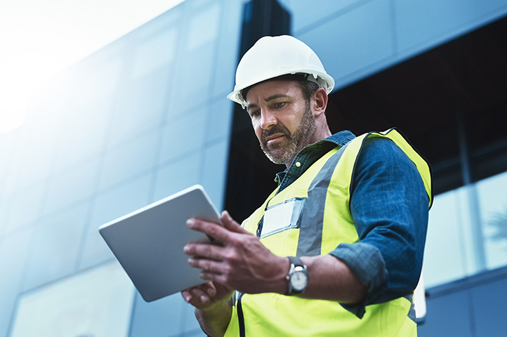 Man using device on job site