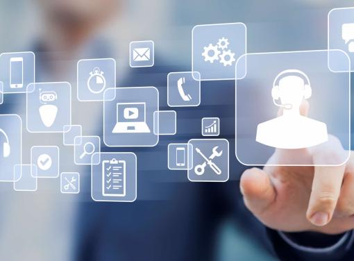 Person interacting with floating digital icons representing customer support, communication tools, and technology services.