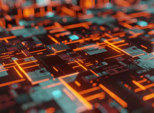 Abstract close-up of a futuristic circuit board with glowing orange and blue lines forming a digital network pattern.