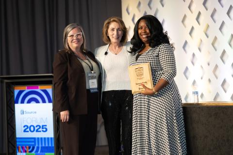 Attendees accepting the Small Utility Excellence Award at Forum.